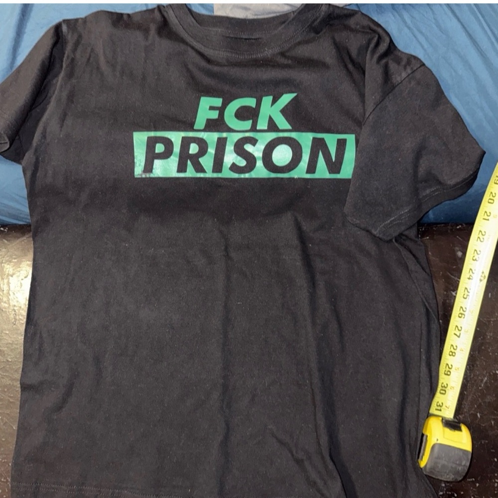 Black Graphic T-Shirt with Green Text